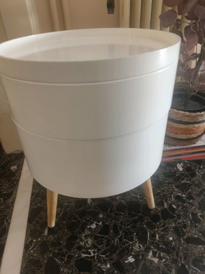 Side table used, round with storage