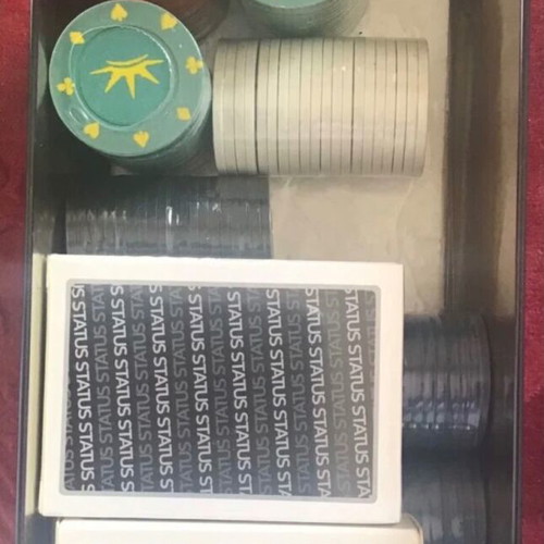 Poker set new in metal case with chips and cards