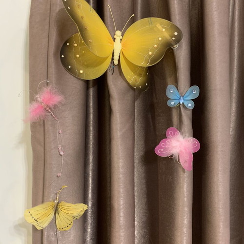 Decorative butterflies like new, yellow, pink, and sky blue for crafts