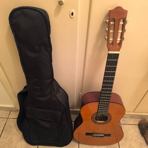 Classical guitar with fabric back case like new