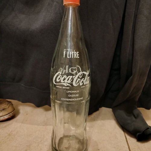 Coca-Cola bottle French like new with original cap
