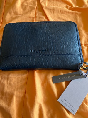 Urbancode wristlet bag new, dark blue leather
