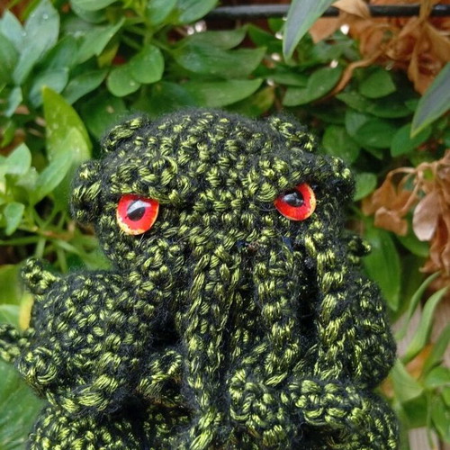 Handmade knitted Cthulhu amigurumi with green metallic yarn new
