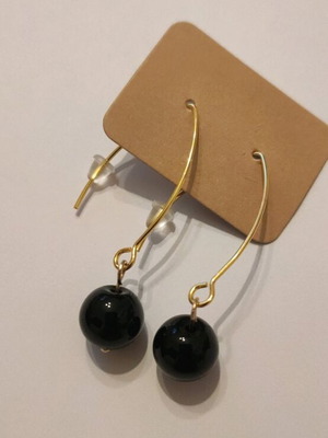 Handmade earrings new with steel hooks and 10mm black and gold bead