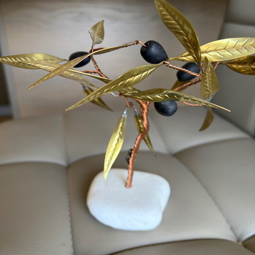 Handmade olive decoration on marble base used