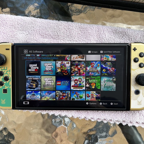 Nintendo Switch OLED Zelda Edition modded with 512GB and Zelda Joy-Cons like new