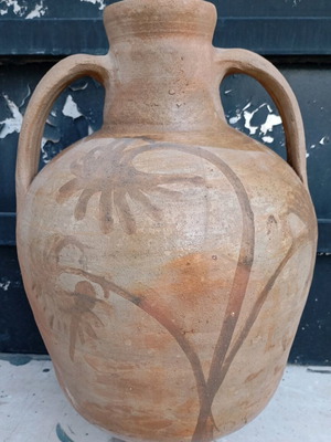 Clay jug used with plant decoration from Crete