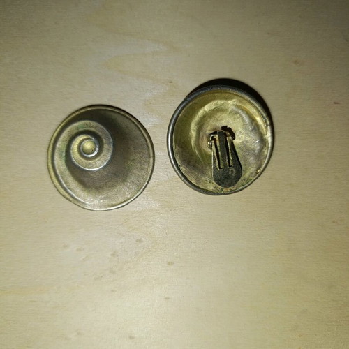 Ancient-style earrings like new made of metal