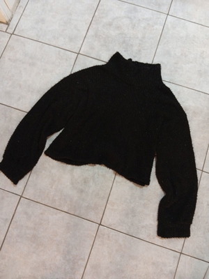 Black sweater size L with back burn detail