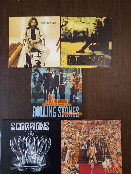  set me 5 monadika CD apo eric Clapton -Sting- Rolling Stones-Scorpions ke to vivlio tie veaTLES - ta skatharia apokaliptonte