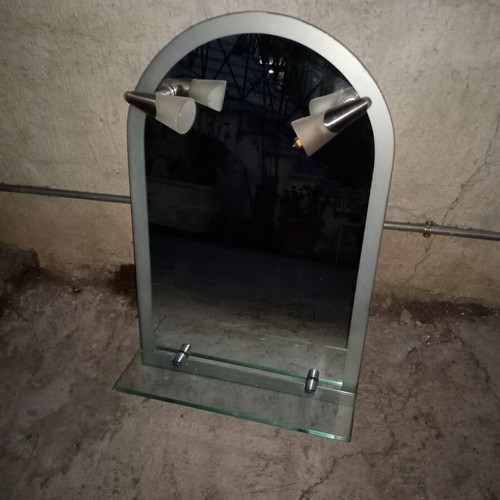 Semi-circular bathroom mirror used with 2 lights and shelf