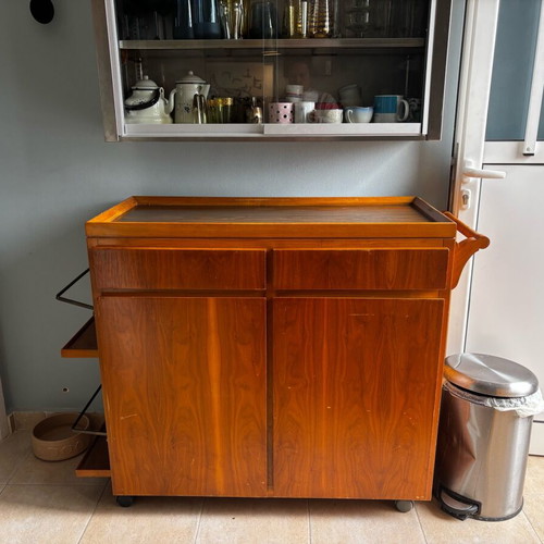 Solid wood bar used with wheels and storage shelves