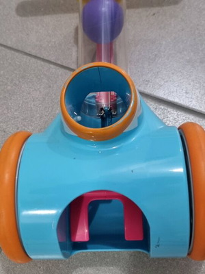 Children's toy used with balls and buttons