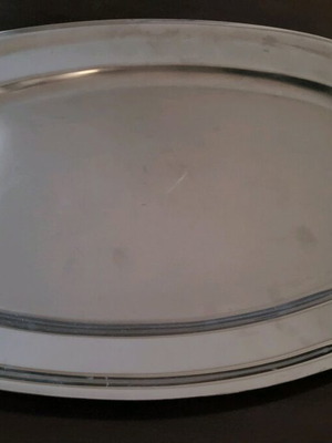 Stainless serving tray like new with detailed handles
