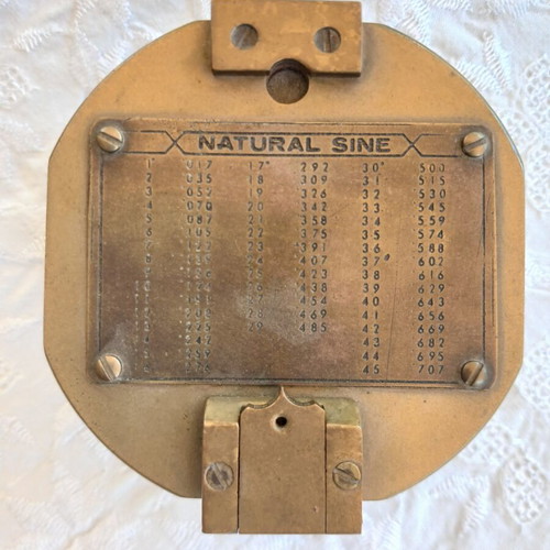 Vintage brass compass used with natural sine table