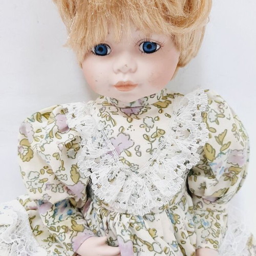 Vinyl doll 33 cm with elastic joints, blonde hair, dress and shoes, like new