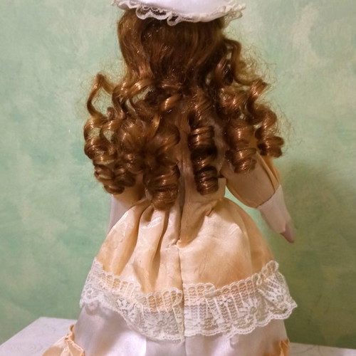 Vintage porcelain doll used