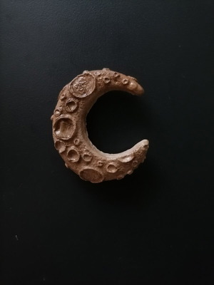 Handmade magnet from white cement, acrylics and varnish