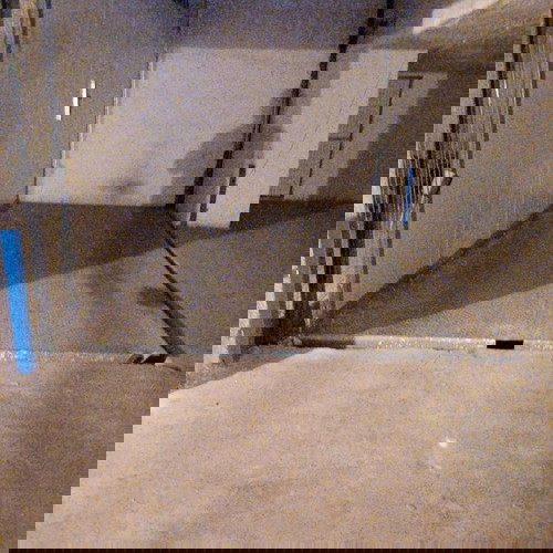 Underground parking space with car elevator, Athens Three Bridges