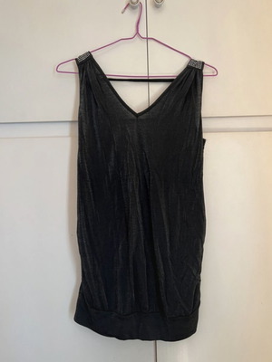 Pink Woman sleeveless black blouse like new with rhinestones on shoulders, size S/M