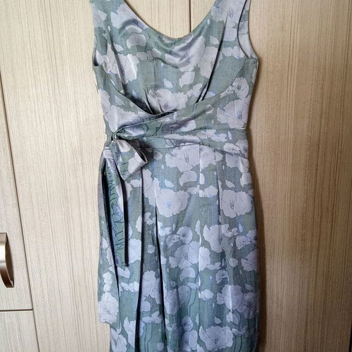 Lola cocktail dress like new, midi green with silver patterns