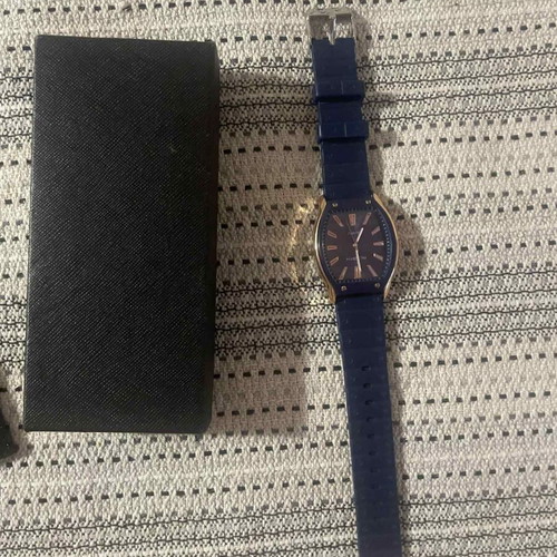 Unisex wristwatch with blue strap and gold details, like new