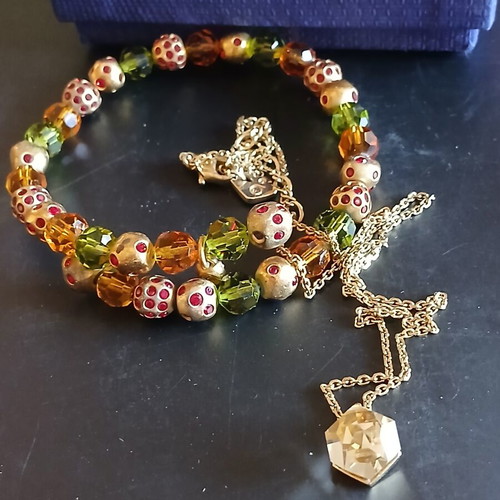 Swarovski necklace and bracelet set like new, gold color
