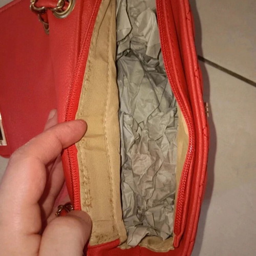 Red small crossbody bag like new with gold details