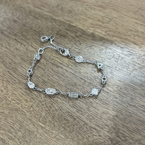 Swarovski jewelry set with bracelet and Matrix Baguette Cut ring like new, silver