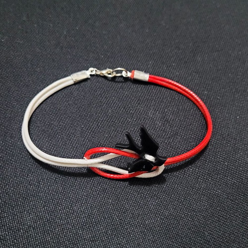 Martis swallow bracelet like new, handmade, white and red cord