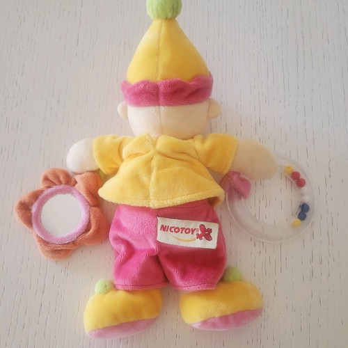 Nicotoy plush doll with rattle and belly horn for babies like new