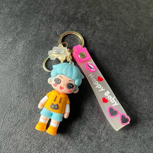 Happy boy keychain unused, multicolored