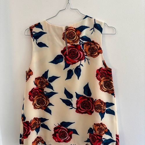 Sleeveless blouse like new with red flowers Darling, ecru