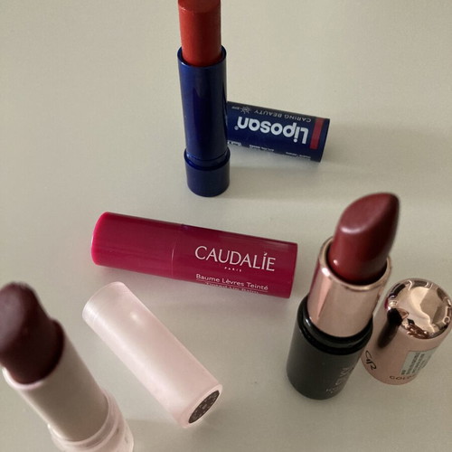 Lipsticks and lip balm used, branded set