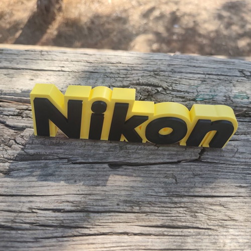 Nikon 3D logo stand decorative, new