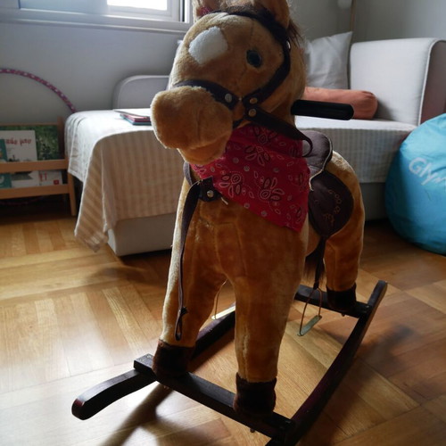 Hoppline rocking horse toy used with sounds and music