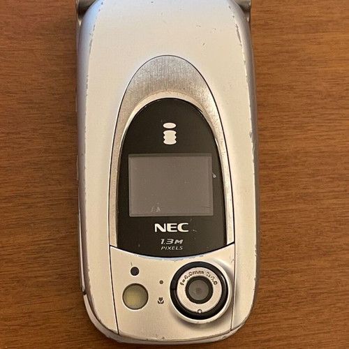 NEC 410i mobile phone used with charger and handsfree