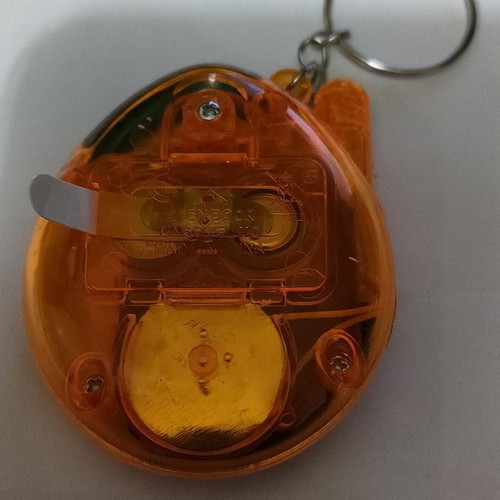 Tamagotchi Connection Orange Transparent like new