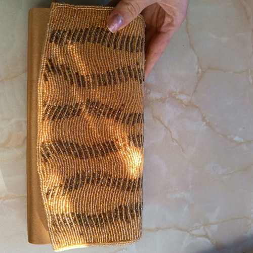 Gold beaded hand bag like new