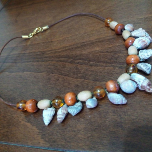 Shell and wooden bead necklace on leather strap used, summer style