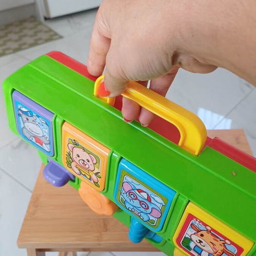 Interactive baby toy suitcase with animal sounds and pop-up features