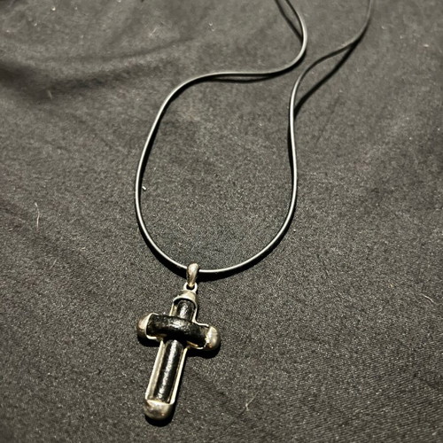 Silver cross with leather like new