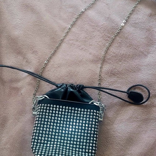 Shoulder bag like new, small black with shiny silver ornaments