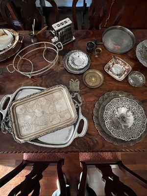 Collection of silver-plated and metal serving items used