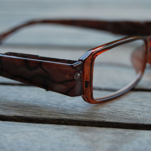 Flash glasses +2.5 used with LED and case, brown