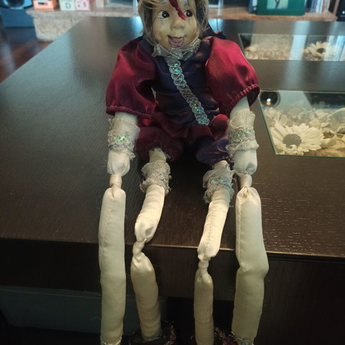 Wind-up Pierrot Harlequin doll used with music