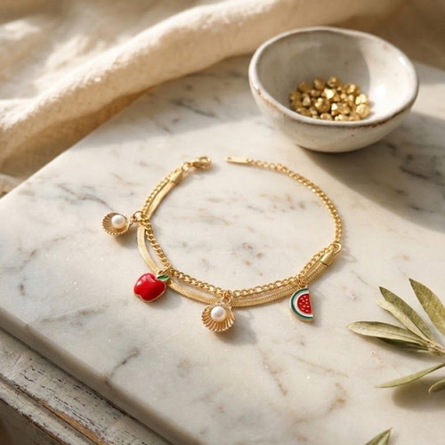 Double stainless steel bracelet with brass decorative charms