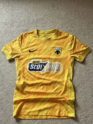 Nike AEK FC ποδοσφαιρική φανέλα σε κίτρινο και πορτοκαλί