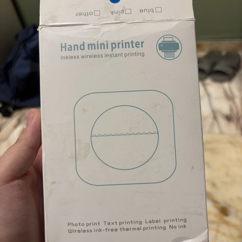 Mini printer like new with 6 rolls, cable and box