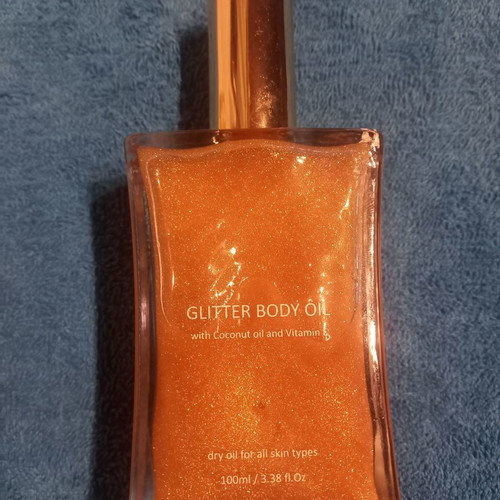 Glitter body oil new with coconut oil and vitamin E